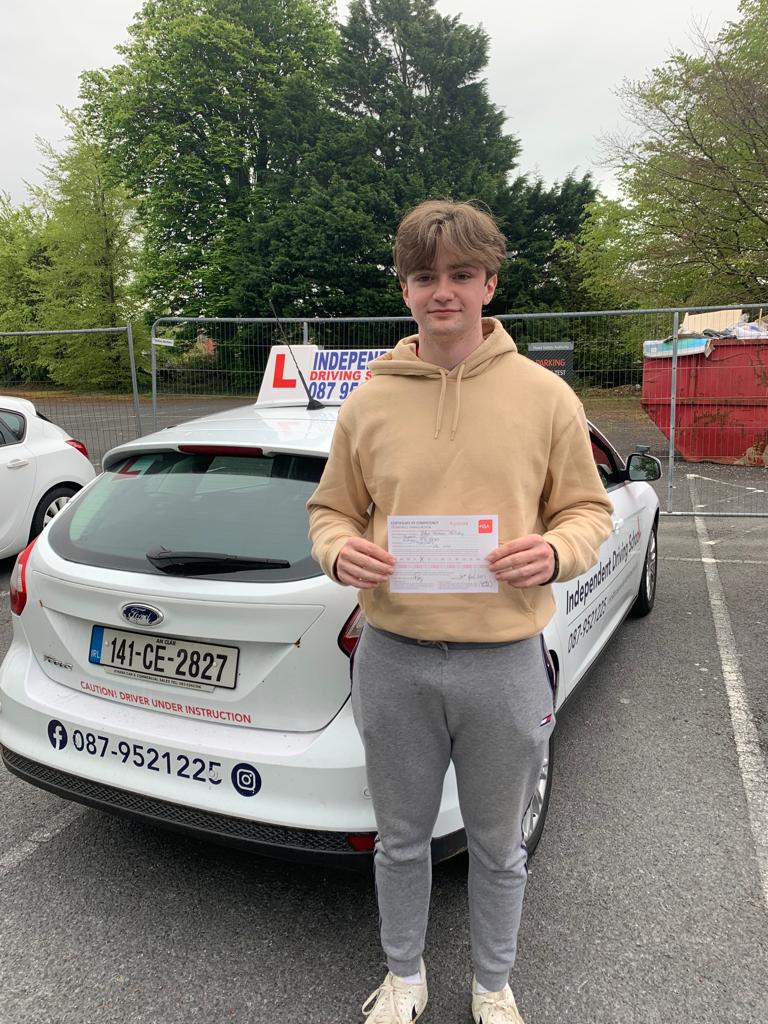 Student with driving test pass certificate