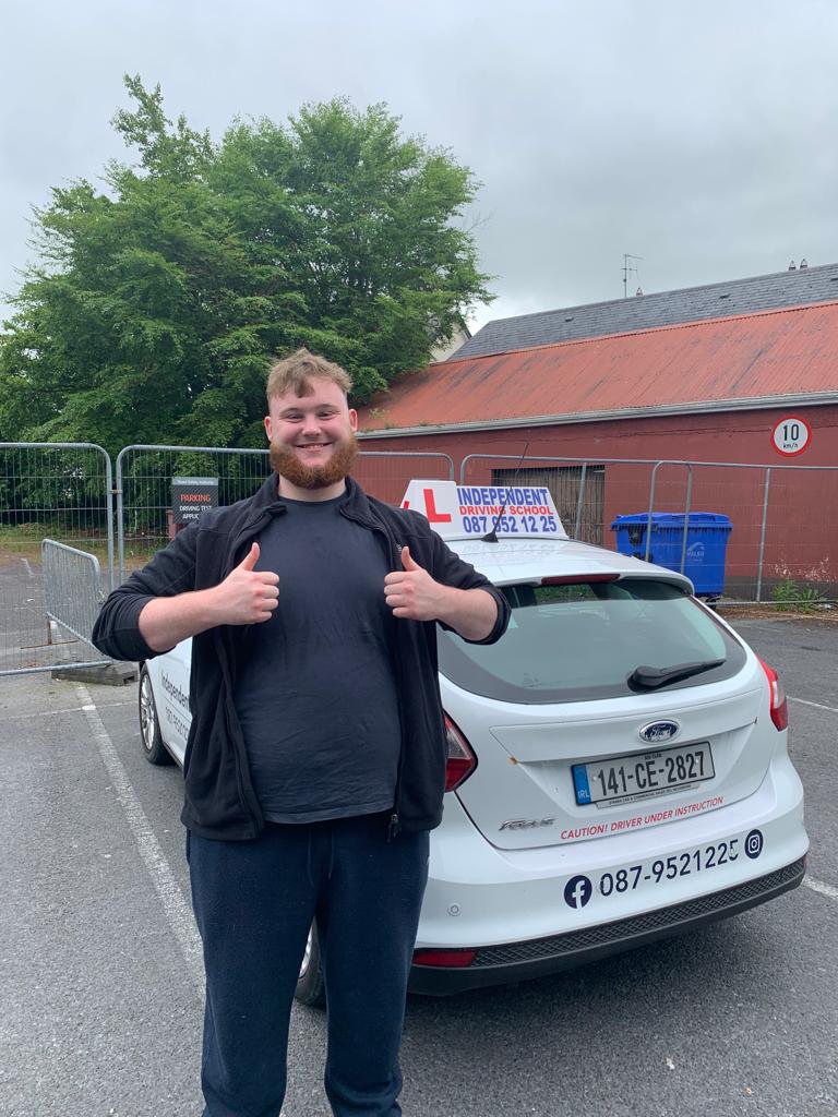 Student with driving test pass certificate