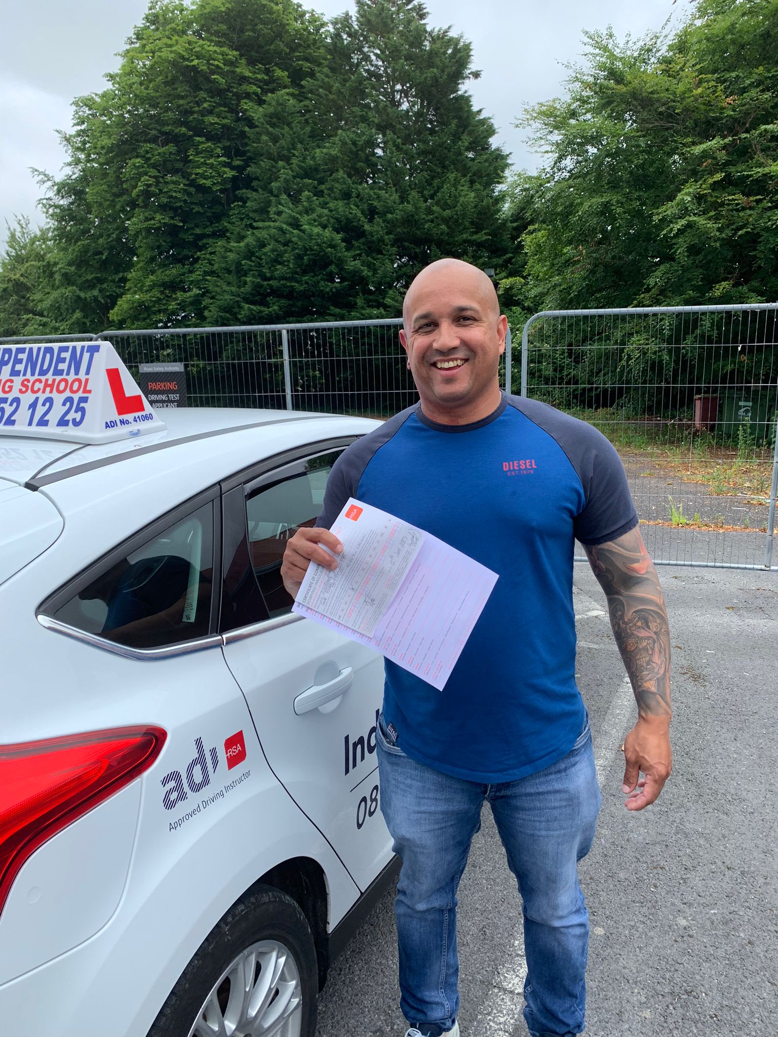 Student with driving test pass certificate