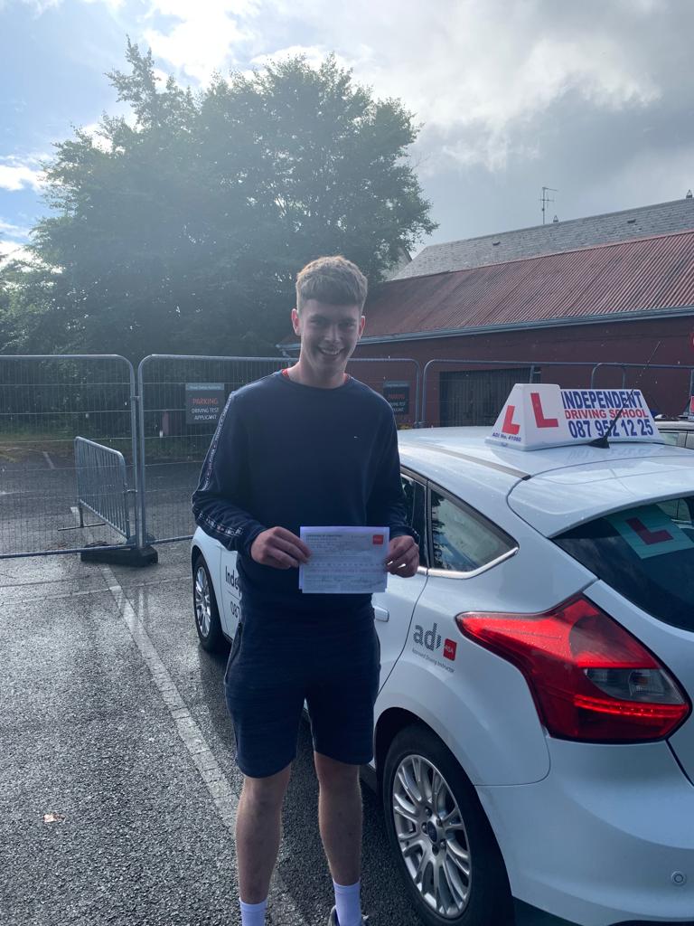 Student with driving test pass certificate