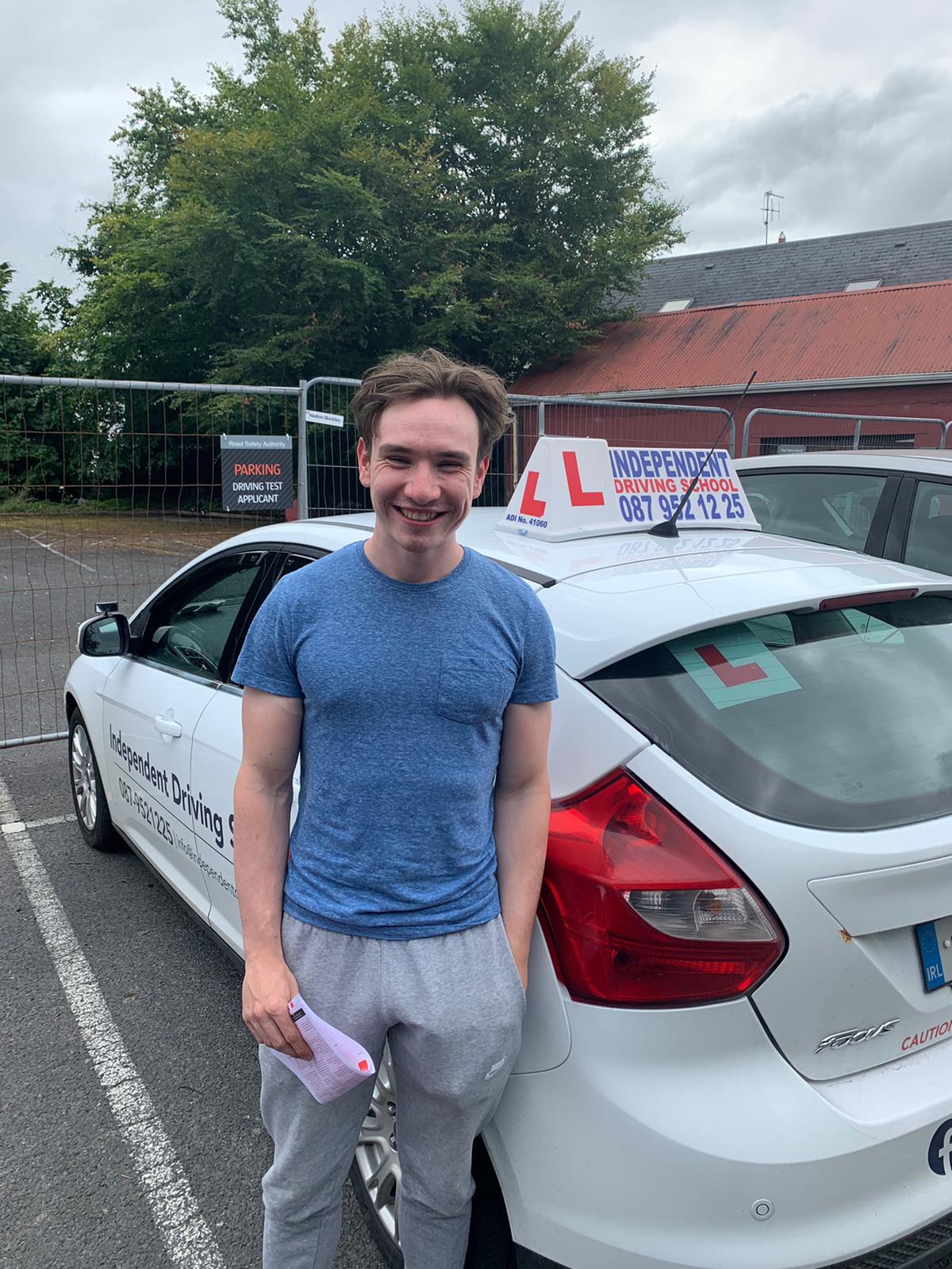 Student with driving test pass certificate