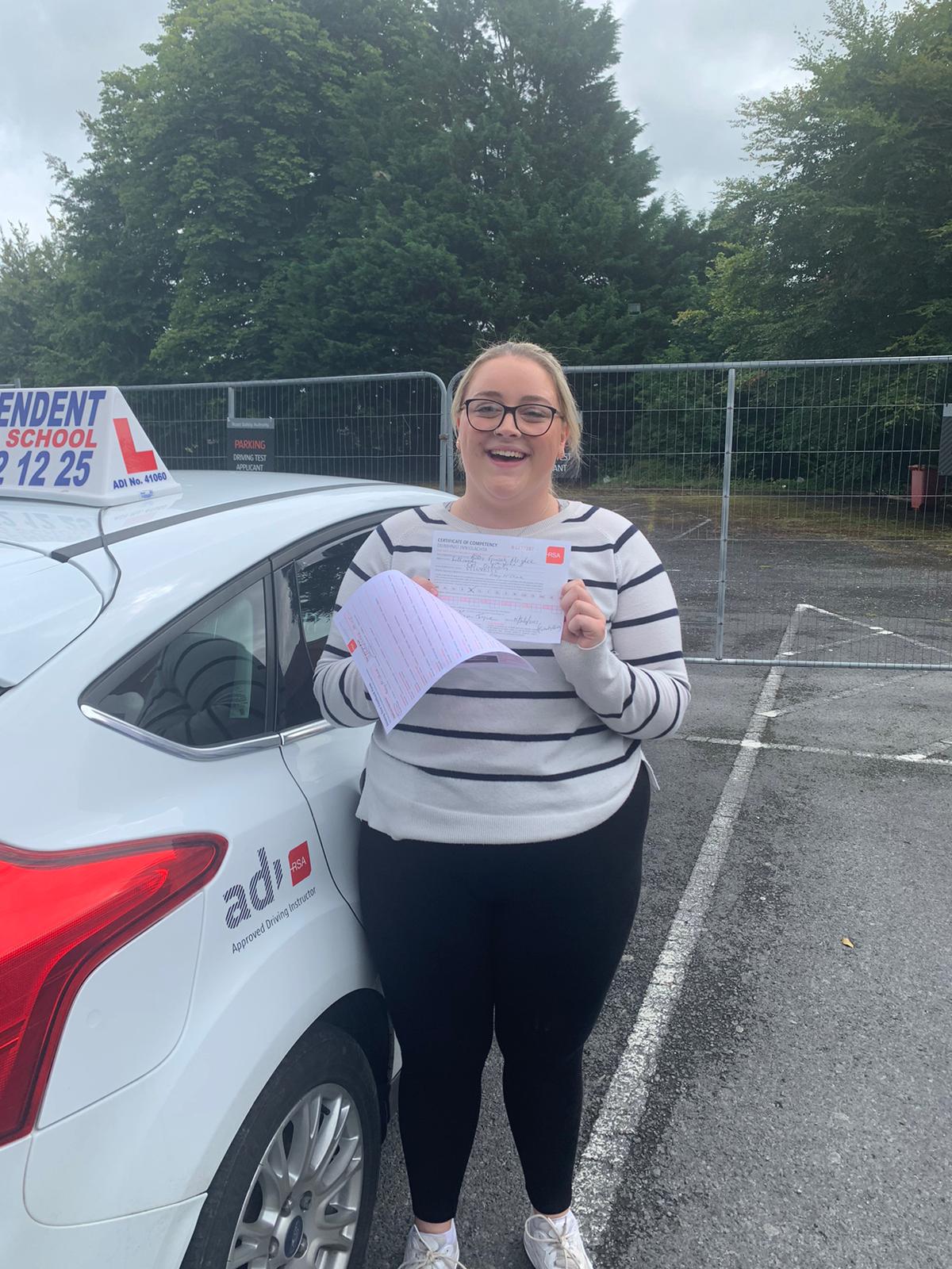 Student with driving test pass certificate