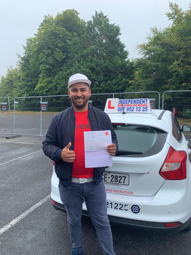 Student with driving test pass certificate