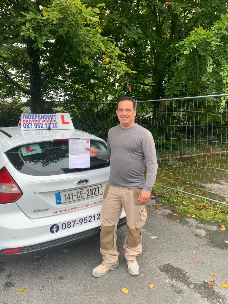 Student celebrating passing their driving test