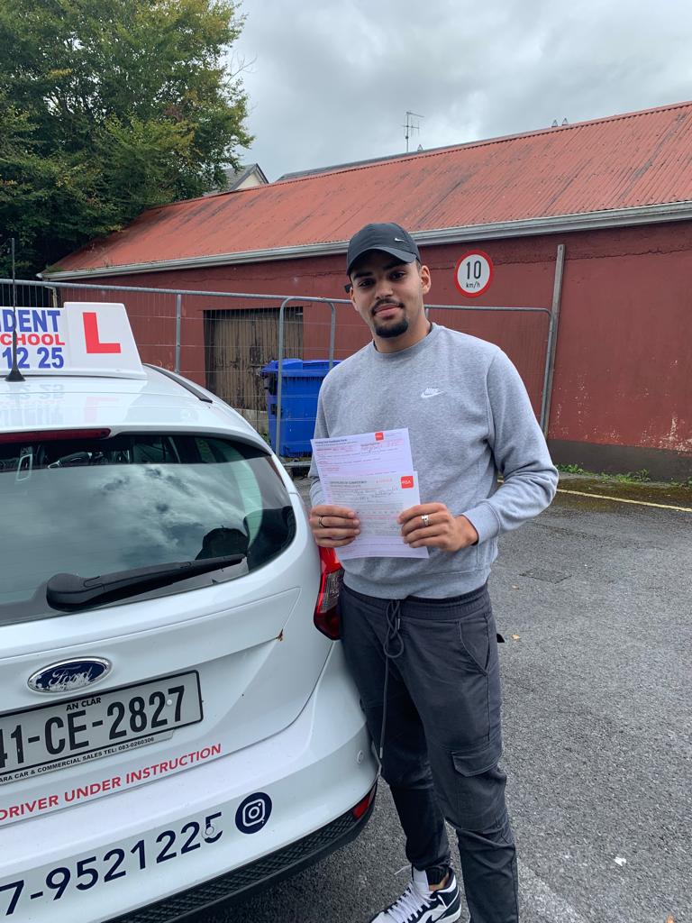 Student with driving test pass certificate