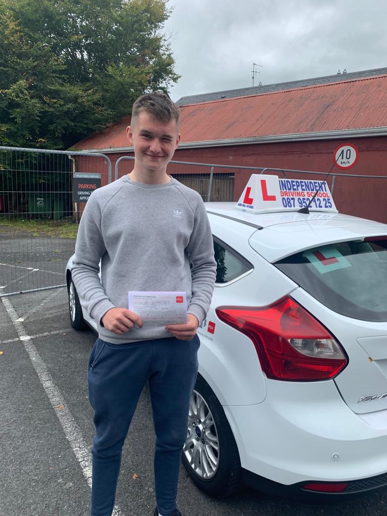 Student with driving test pass certificate
