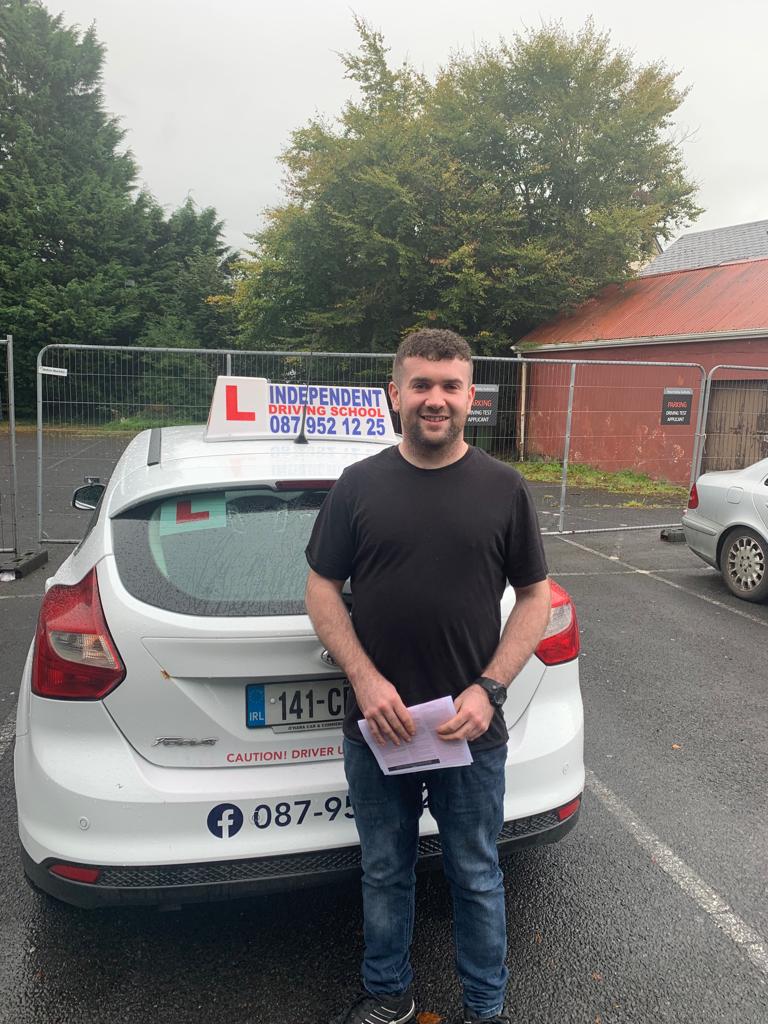 Student with driving test pass certificate