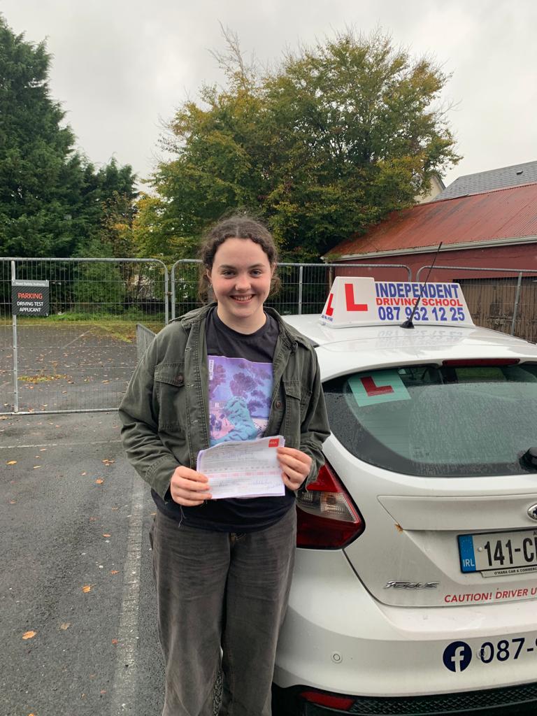 Student with driving test pass certificate