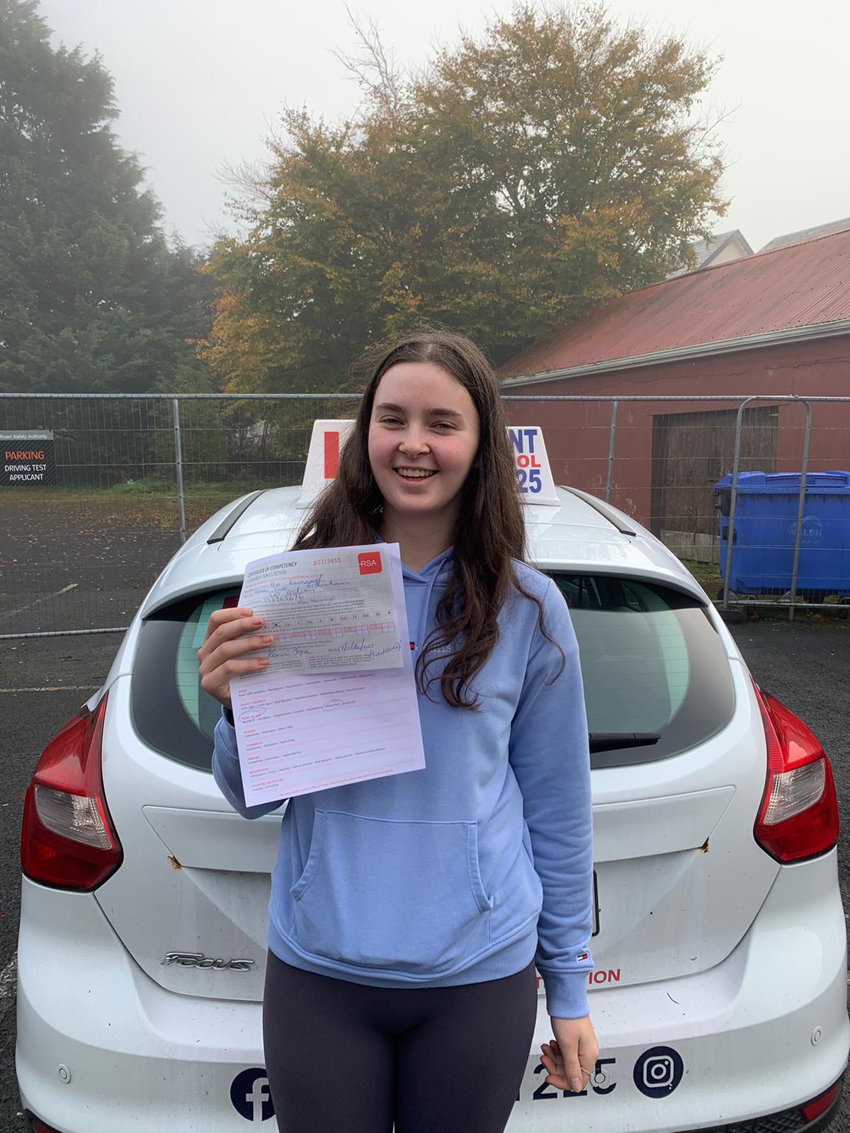 Student with driving test pass certificate