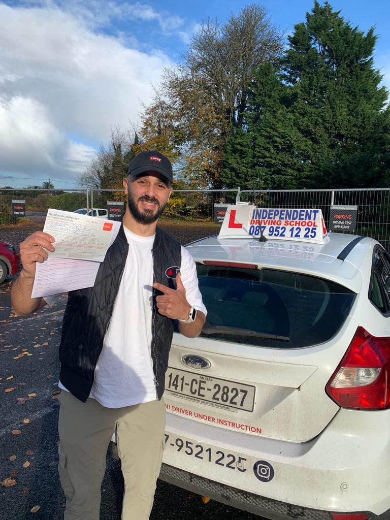 Student with driving test pass certificate