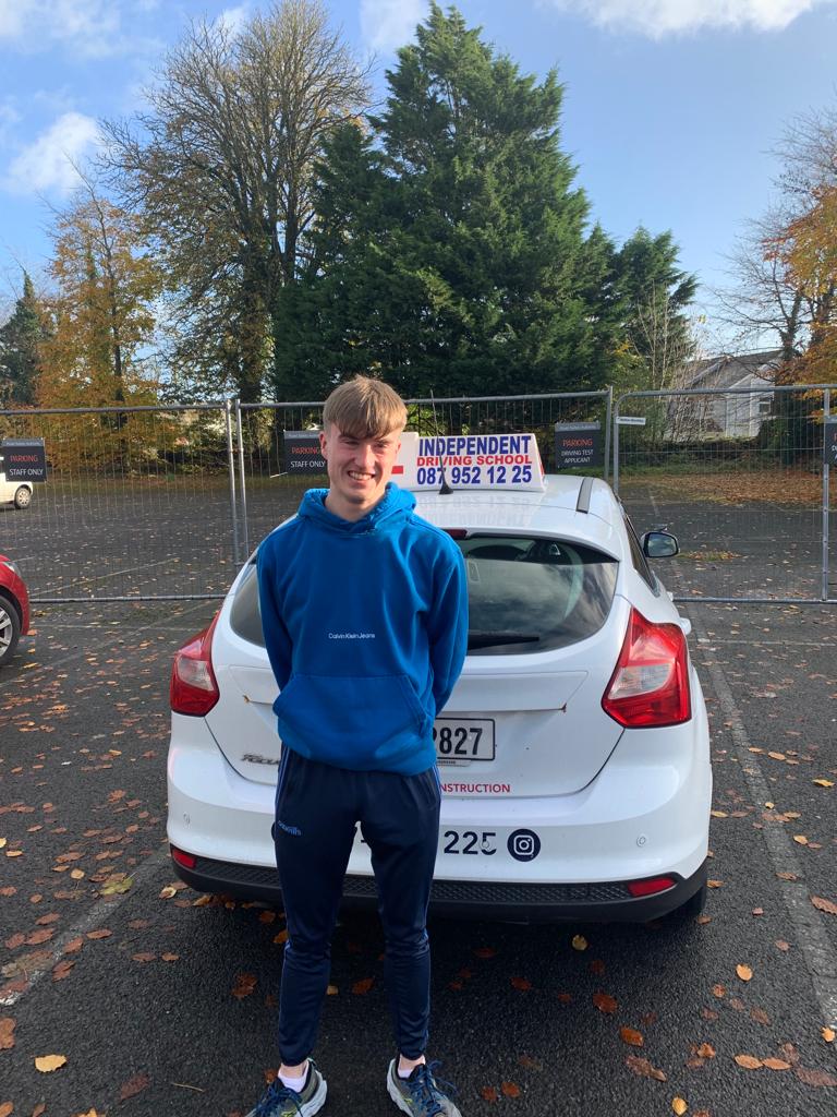 Student celebrating passing their driving test