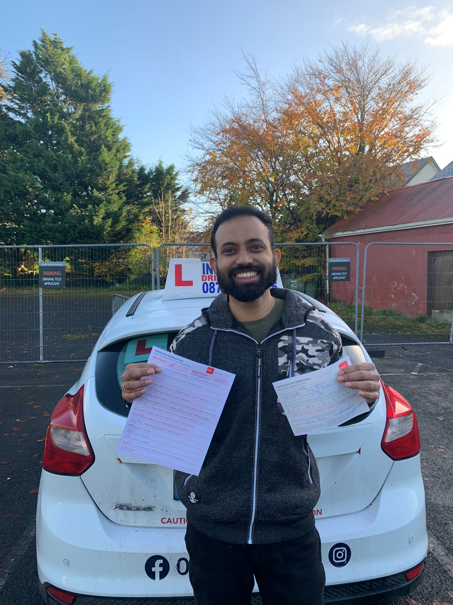 Student with driving test pass certificate