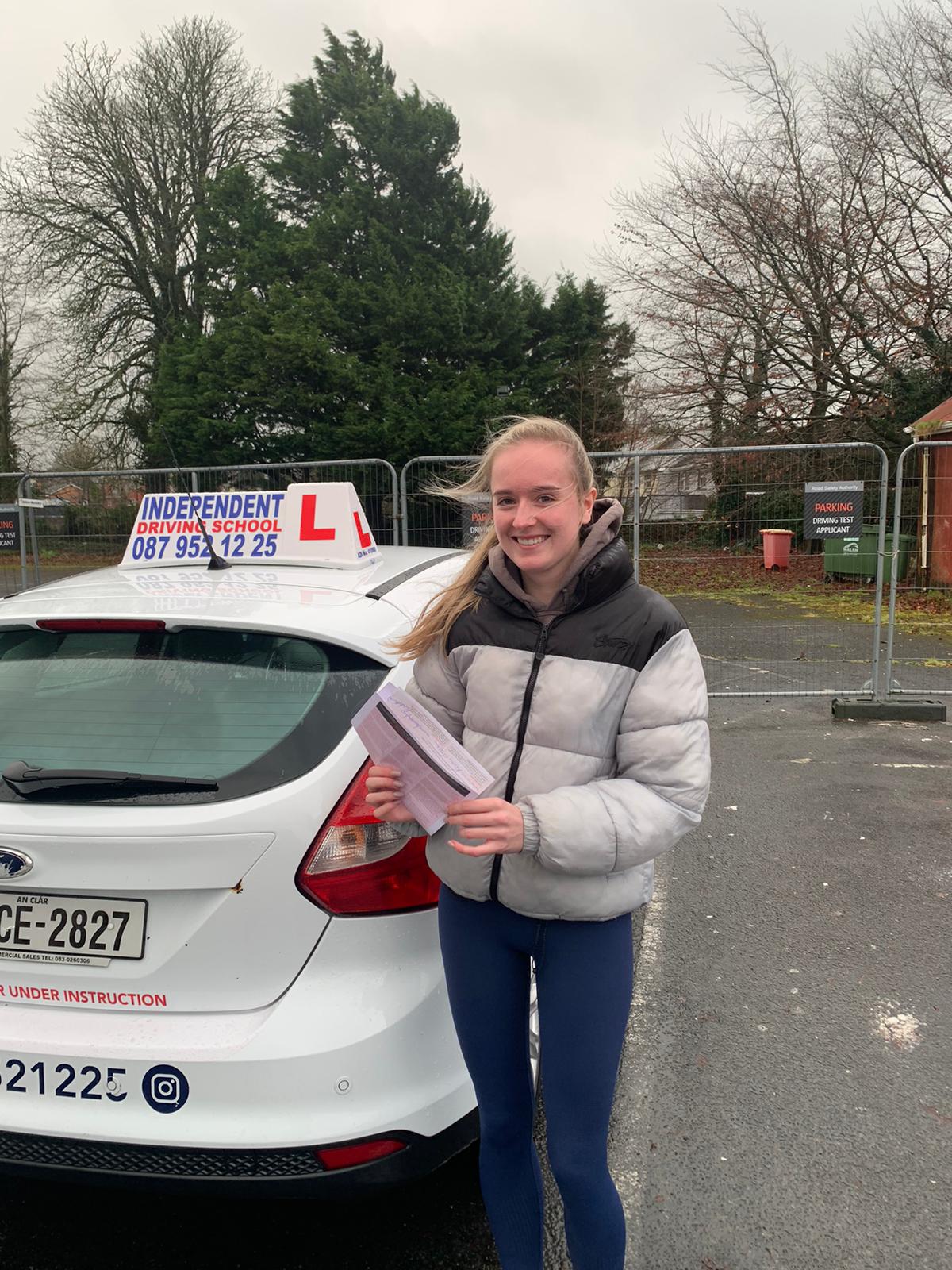Student with driving test pass certificate