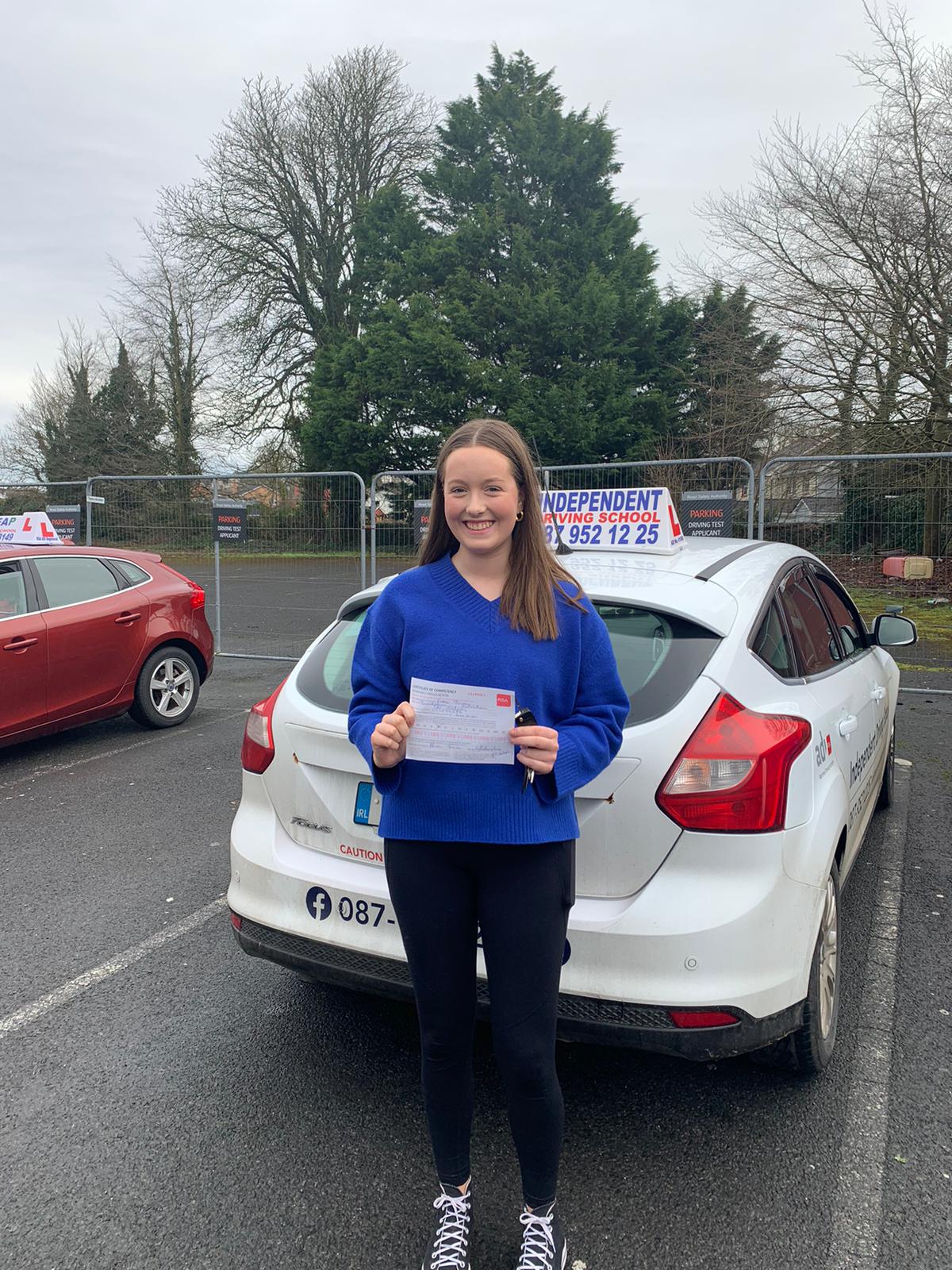 Student celebrating passing their driving test