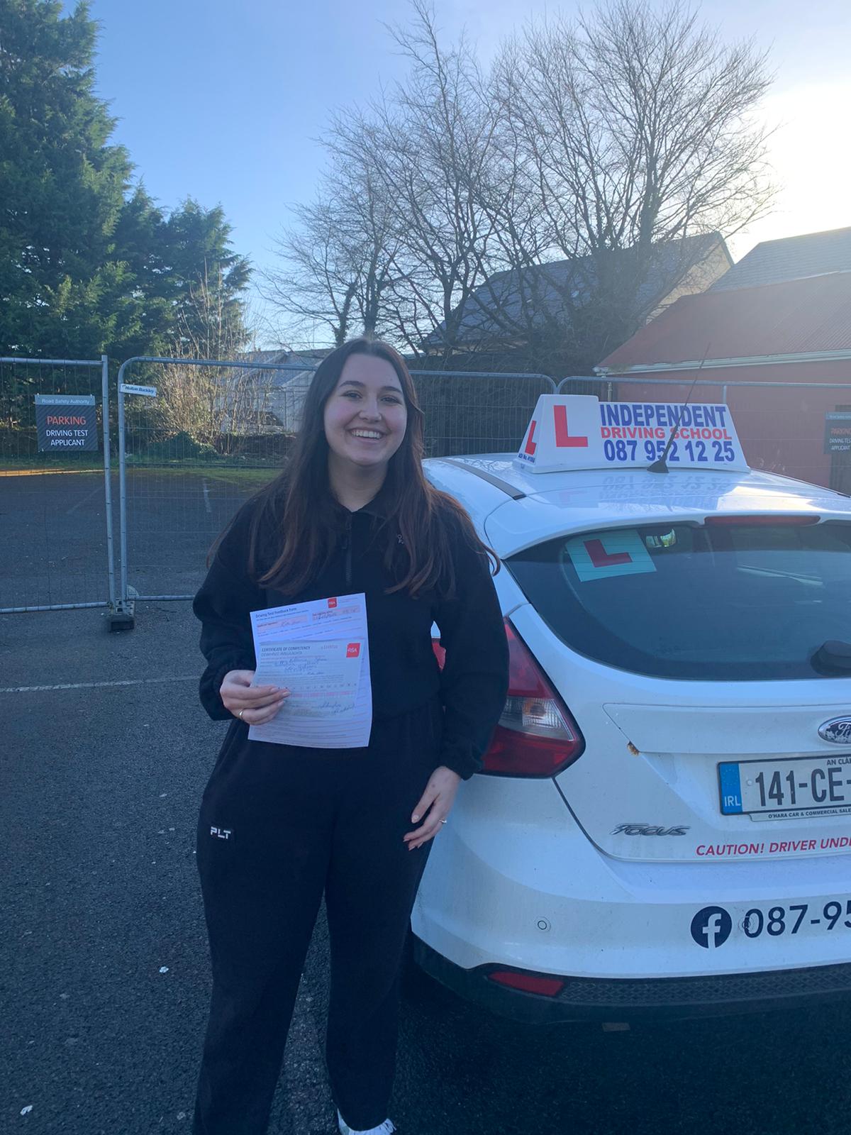 Student with driving test pass certificate