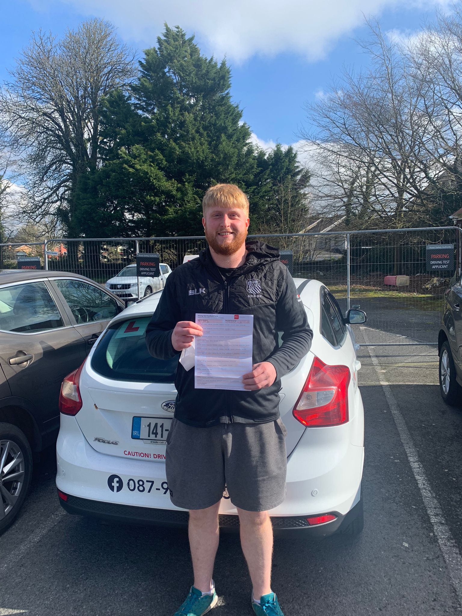 Student with driving test pass certificate